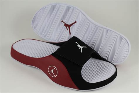 jordan slides with velcro strap.